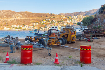 Fishing boats in the village of Symi at sunset.