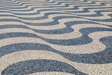 Undulating, Dizzying Waves of Black and White Limestone Tiles on a Sidewalk in Lisbon, Portugal - 784156115