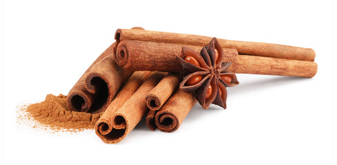 Dry aromatic cinnamon sticks, powder and anise star isolated on white
