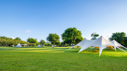Tents on Camping Grassland in the Park in the Morning © zhonghui