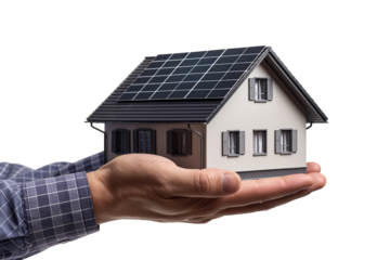 Hand-holding house with solar panels on the roof isolated on a transparent background