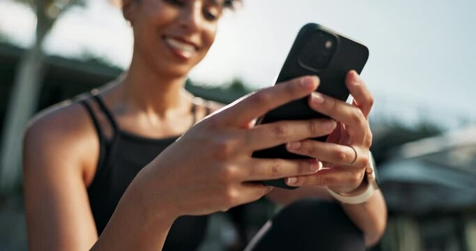 Hands, woman and smartphone outdoor for fitness app, communication and scroll social media for workout tips. Using phone on exercise break, sports blog with connectivity and happy with online chat