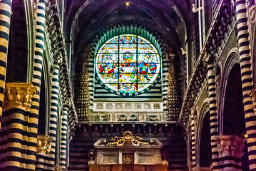 Siena, Italy - May 11 2013: Interior of Siena Baptistery of San Giovanni - obrazy, fototapety, plakaty