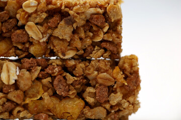 Granola bar with chocolate isolated on white background