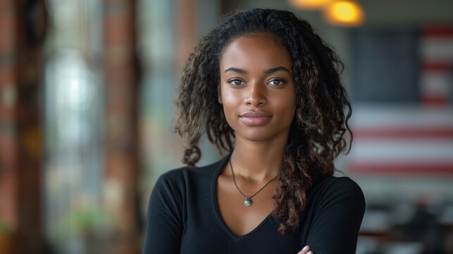 Portrait of a young woman in front of the American flag