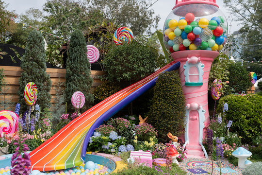 A garden with flowers and lolipops