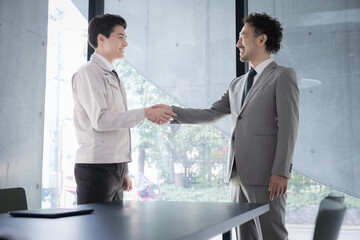 Contracts and collaborations Businessman shaking hands Construction manager or site supervisor and the president Images of successful business negotiations, alliances, and contracts.