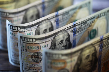 Money, US dollar bills background. Money scattered on the desk. Photography for Finance and Economy...