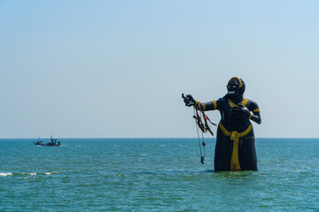 Statue of Pee Seua Samut, the character of a Thai book, at Puek Tiam beach, Cha-Am, Thailand
