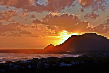 Landscape with a beautiful sunset over Betty's Bay and the False Bay