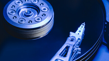 hard disk drive. computer digital data storage device. blue toned image. - 784216325
