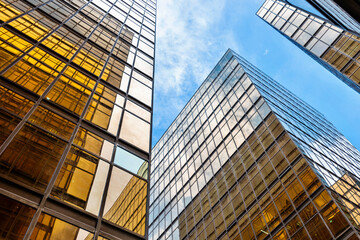 Fototapeta premium Low angle view of modern office buildings in HongKong