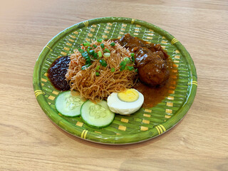 traditional peranakan wok fried nonya mee siam noodle spicy chilli shrimp paste w chicken rendang...
