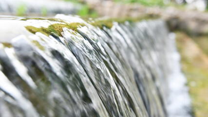 Water running down the stone step