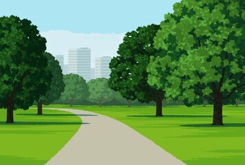 公園の木々と道とビル