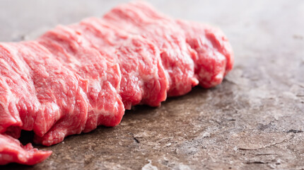 Fresh raw meat on stone plate