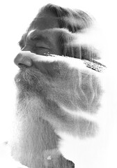 A half-profile paintography portrait of an old bearded man in double exposure