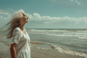 Fototapeta na wymiar Serene Elderly Woman Enjoying a Sunny Day by the Sea With Wind in Her Hair
