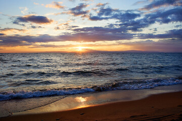 Fototapeta premium Beautiful summer sunset on the sea. Sandy beach.