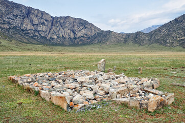 Ancient burials in the Altai mountains. This place is a terrace of the Katun and Bolshoy Yaloman rivers. - 784264129