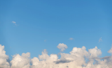 White clouds on clear sky