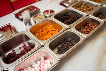 Ingredients for making handmade chocolates and candies in a workshop