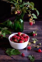 Fresh raspberries in bowl. Ripe juicy fresh raspberries. Organic raspberries, healthy food, vitamins, summer berry fruit. Long banner format. place for text.