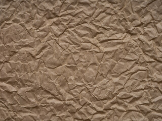 A rugged landscape of taupe, the paper's crinkles map out an intricate geography of texture and tone