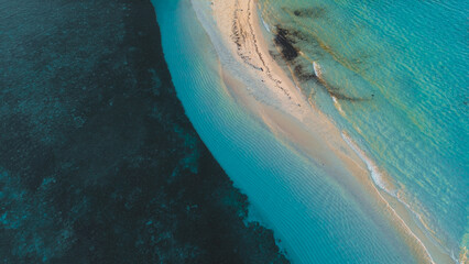Aerial View of the Sandy Beach with Turquoise Water