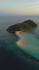 Aerial View of a Beautiful Tropical Island with White Sand Beach and Turquoise Sea