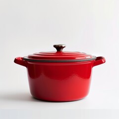 A vibrant red enameled cast iron Dutch oven on a white background, symbolizing home cooking and kitchen essentials.