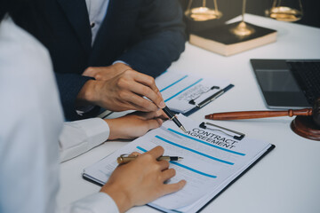 Businessman and Male lawyer or judge consult having team meeting with client, Law and Legal services concept.