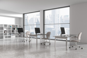 White hot desk office corner with row of compact computer desks - obrazy, fototapety, plakaty
