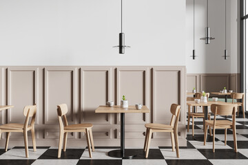 Stylish modern cafe interior with chairs and tables in row, panoramic window