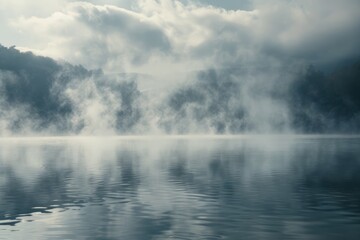 Obraz na płótnie Canvas serene lake shrouded in swirling smoke with mist rising from the waters