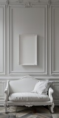 White couch in front of white wall