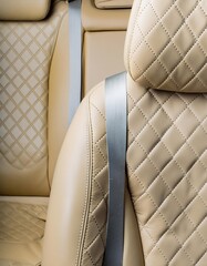 Detail of a leather seat belt in a modern luxury car.