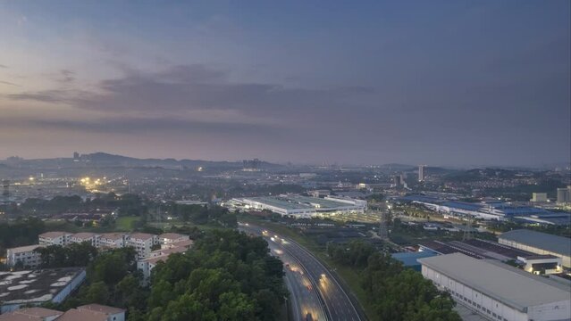 time lapse of transport traffic in highway at selangor, malaysia during sunrise in 4k resolution