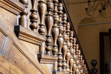 Wooden old decorative balusters, Ancient wooden stairs. decorative railings carved from wood