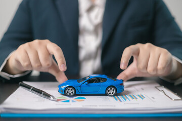 Agent facilitated a business deal, finalizing the agreement for automobile insurance to protect the vehicle during transport. car insurance concept.