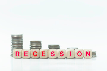 A stack of wooden blocks with the word recession written on them