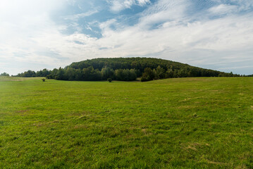 Borcianska planina covered by meadow and forest covered hill in Slovensky kras national park in Slovakia