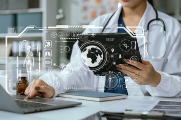 Medical Technology Concepts The doctor is working on a tablet and audio player and a digital tablet...