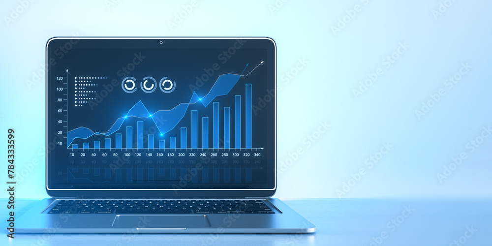 Aufkleber close up of laptop with growing digital business chart on light background with mock up place. busin