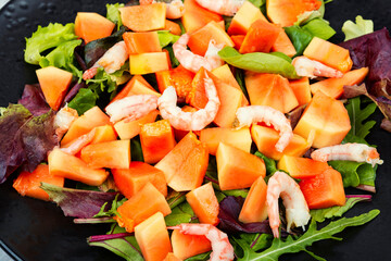 Seafood salad and papaya. - 784337907