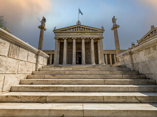 Stairs leading to the  the national university of Athens with Athena and Apollo marble statues...