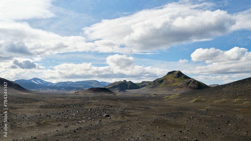 Wall mural beautiful landscape of mountains in landmannalaugar against a blue cloudy sky