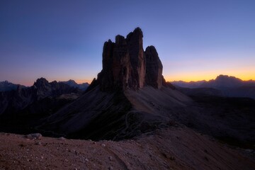 Scenic view of the Three Peaks of Lavaredo with a beautiful sunset in the background