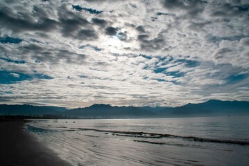 Seascape view on a sunny day with cloudy sky background