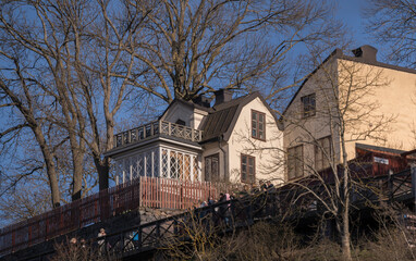 Old 1700s houses on the hill Mariaberget and the vista viewpoint border walk Monteliusvägen in the...